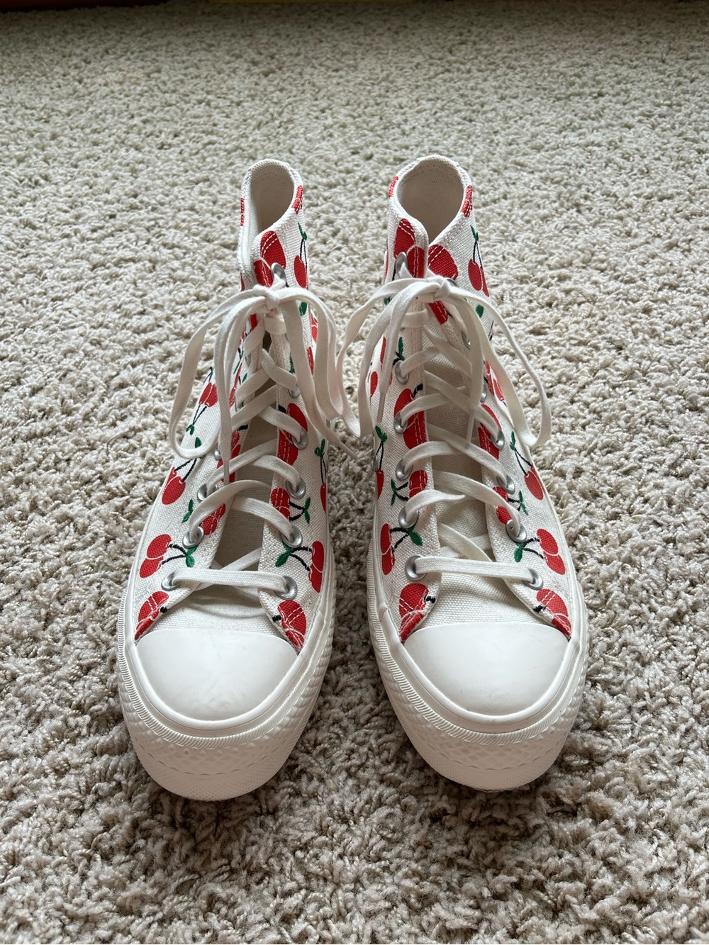 Cherry print converse high tops